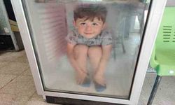 Sıcaktan bunalan çocuk buzdolabına girdi