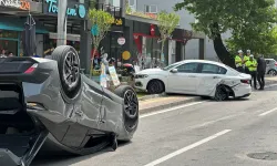 Bursa'da park halindeki otomobile çarptı, takla attı