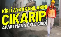 İnegöl'de kirli ayakkabılarını çıkarıp apartmana öyle girdi