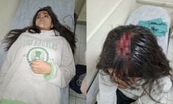 Başına buz kütlesi düşen genç kız yaralandı