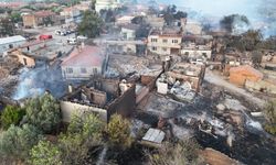 Boşaltıldıktan sonra alevlere teslim olan köy böyle görüntülendi