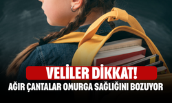 Veliler dikkat!  Ağır çantalar omurga sağlığını bozuyor