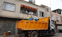 Çöp evden 115 bin lira ve ruhsatsız silah çıktı