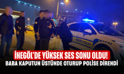 İnegöl'de yüksek ses sonu oldu! Babası kaputun üstünde oturup polise direndi