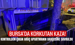 Bursa'da korkutan kaza! Kontrolden çıkan araç apartmanın bahçesine savruldu