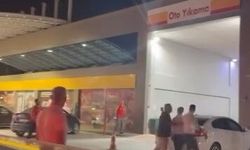 Bursa'da akaryakıt istasyonunda sopalı kavga kamerada