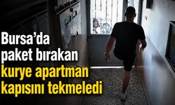 Bursa’da paket bırakan kurye apartman kapısını tekmeledi