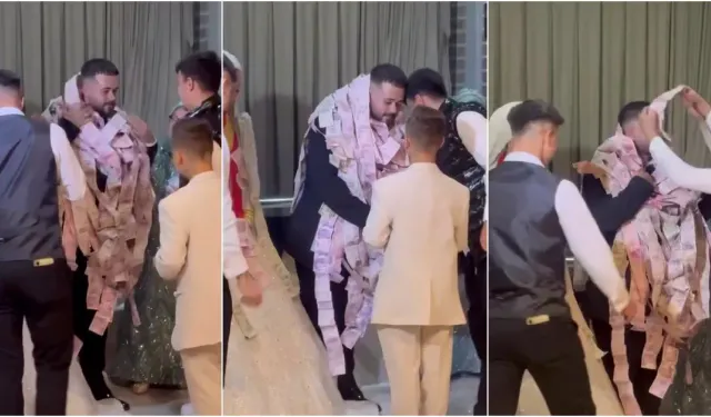 Bursa’daki düğünde damada 50 metre para şeridi takıldı