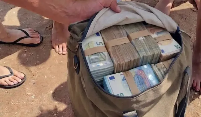 Tatilciler denizde buldu! Çantalardan 700 bin euro çıktı
