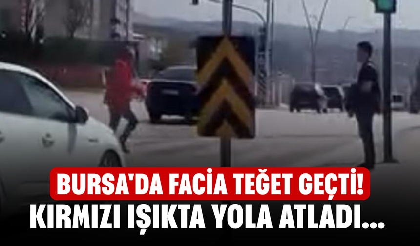 Bursa'da facia teğet geçti! Kırmızı ışıkta yola atladı...