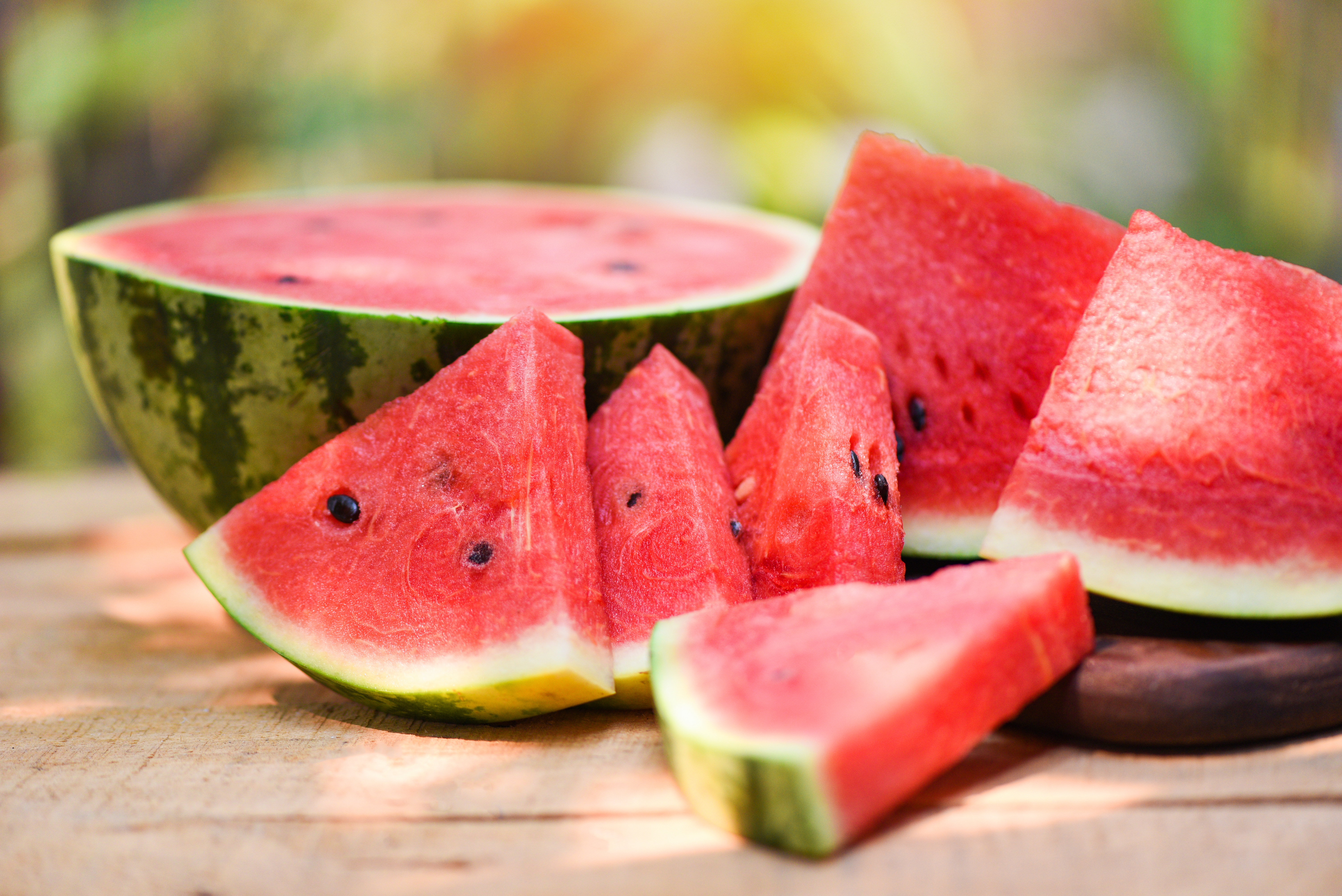 sliced-watermelon-wooden-nature-close-up-fresh-watermelon-pieces-tropical-summer-fruit