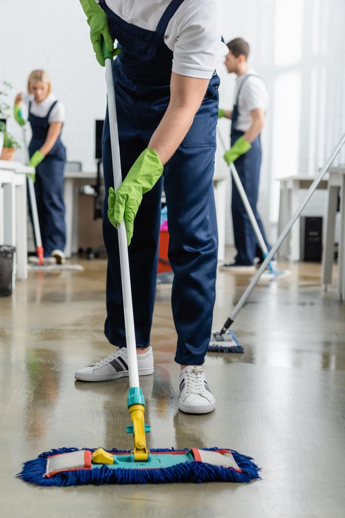 stock-photo-worker-cleaning-service-washing-floor