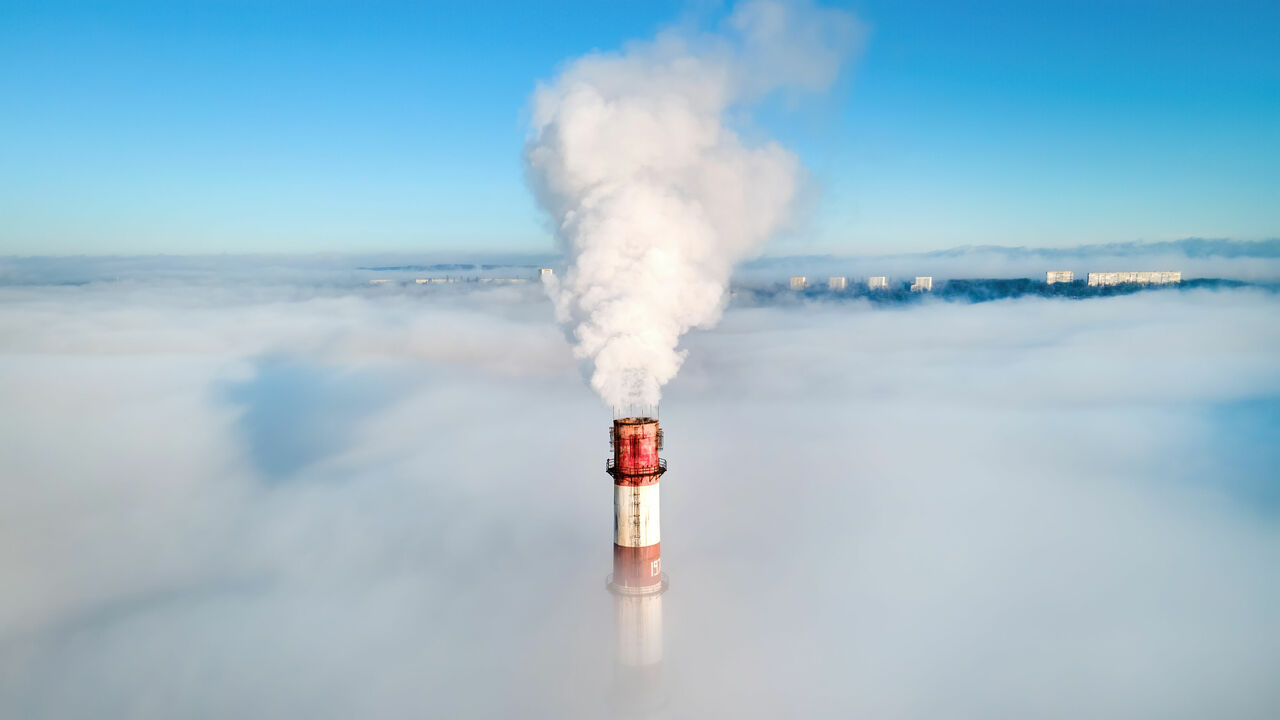 aerial-drone-view-thermal-station-s-tube-visible-clouds-with-smoke-coming-out