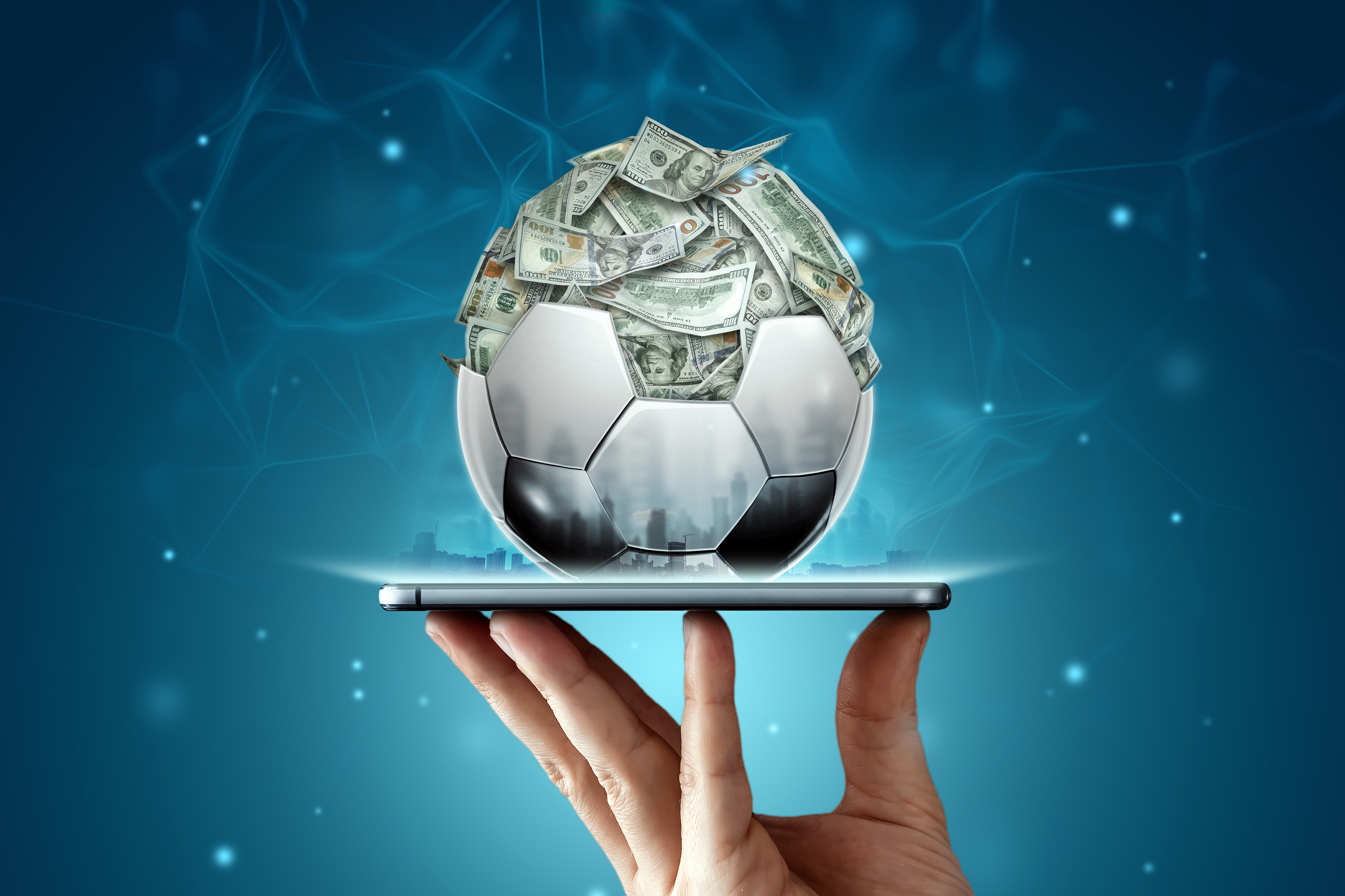 dollars-are-inside-soccer-ball-ball-is-filled-with-money-smartphone-sports-betting-soccer-betting-gambling-bookmaker-big-win