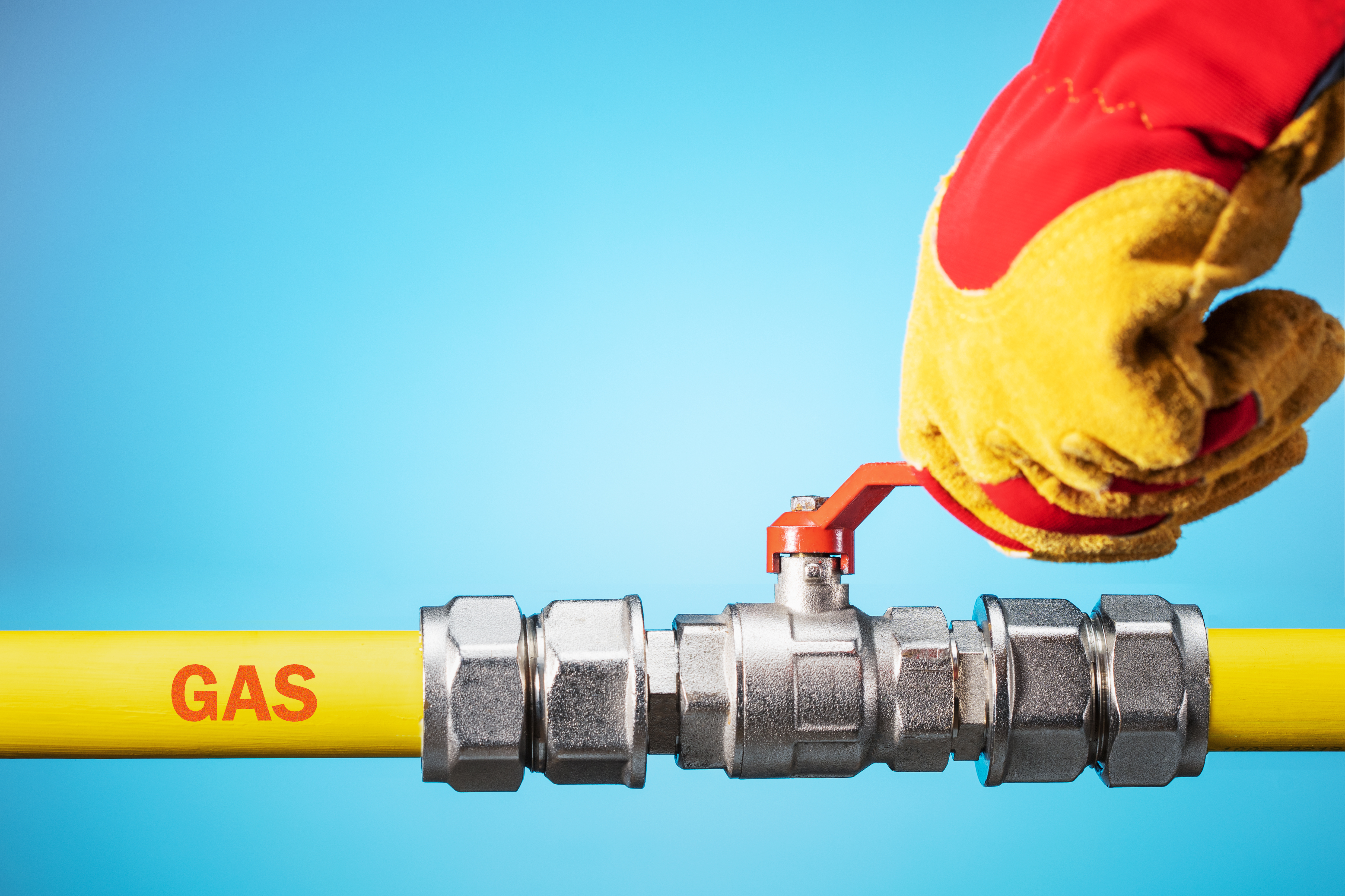 opening-closing-gas-pipeline-gate-male-hand-yellow-glove-opens-closes-gas-valve-gas-pipe-copy-space