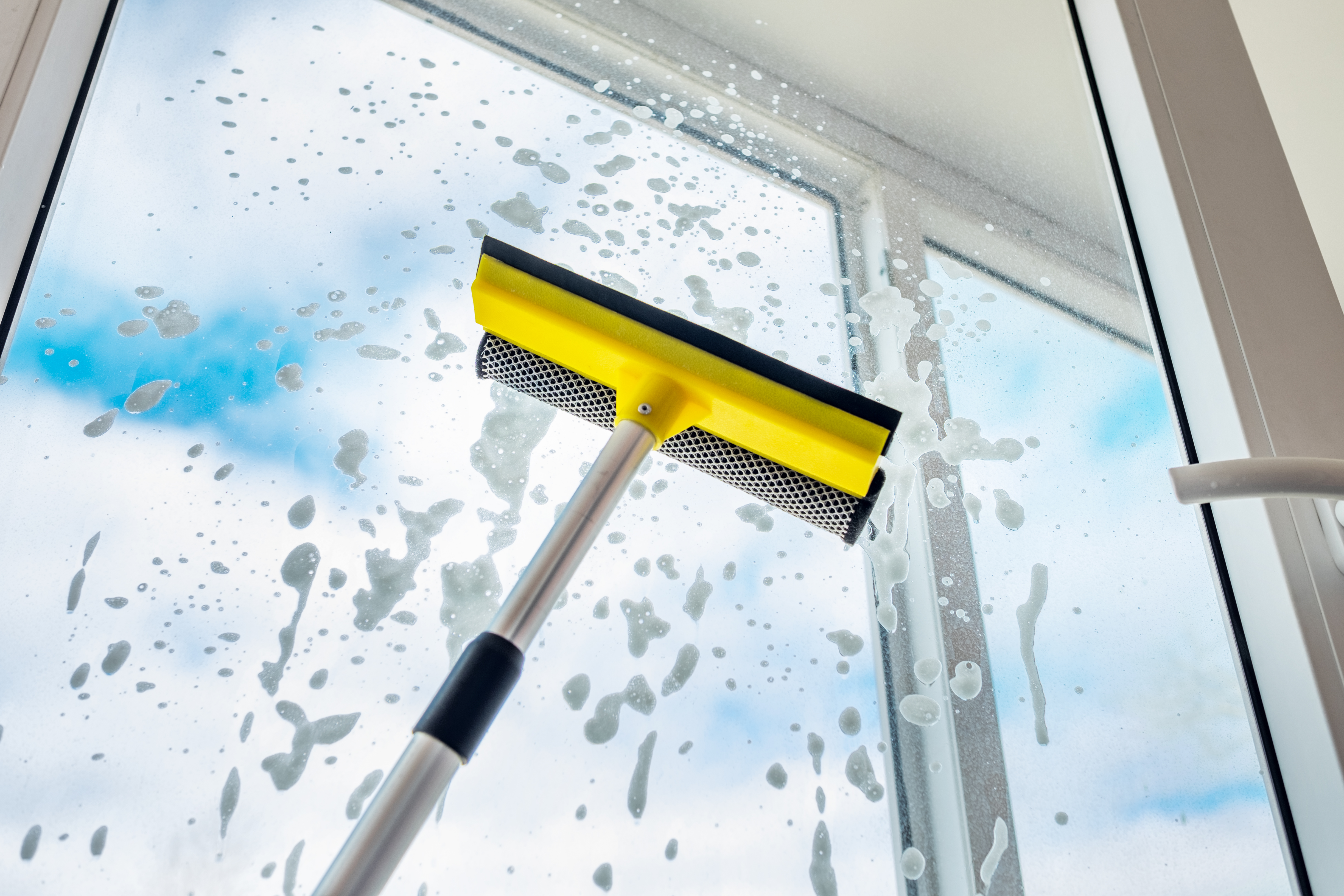 wash-window-blue-sky-white-clouds