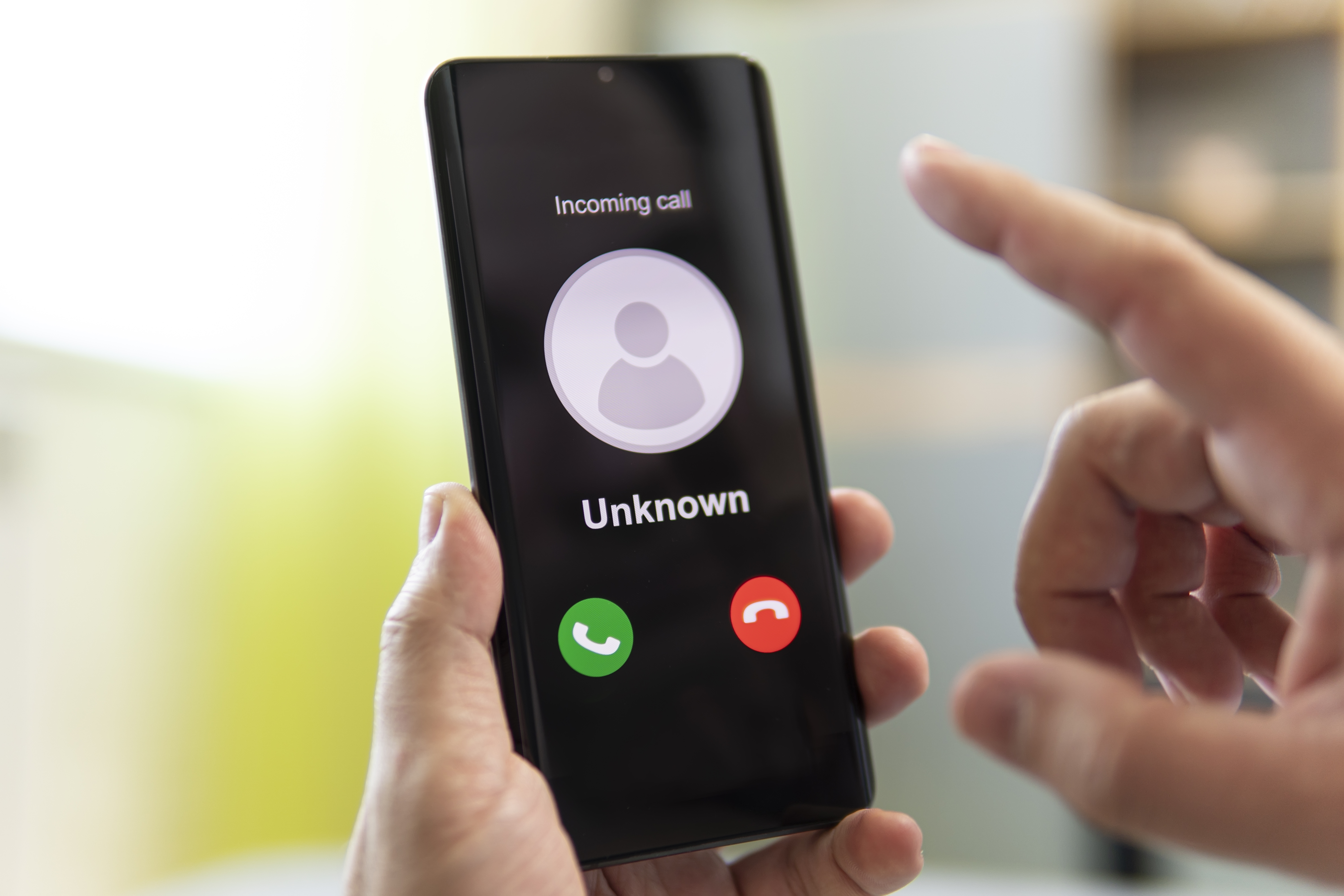 unknown-caller-man-holds-phone-his-hand-thinks-end-call-incoming-from-unknown-number-incognito-anonymous