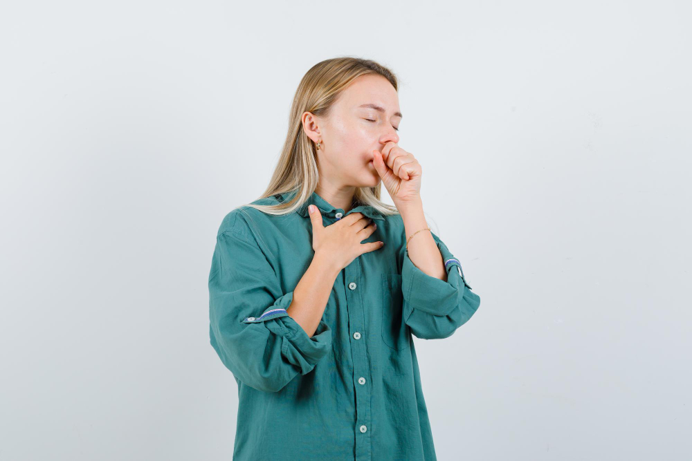 young-lady-green-shirt-suffering-from-cough-looking-sick